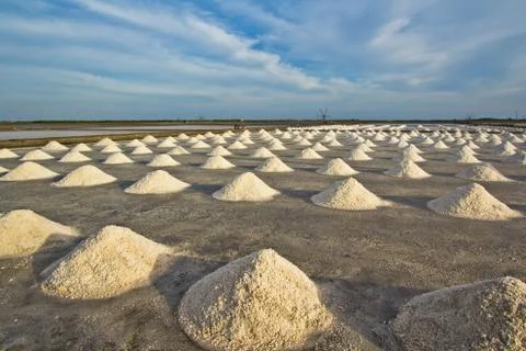 Salt fields in thailand Stock Photos