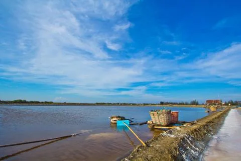 Salt fields in thailand Stock Photos