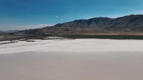 Salt Flat Utah with Mountain in Background Summer Stock Footage 154141637