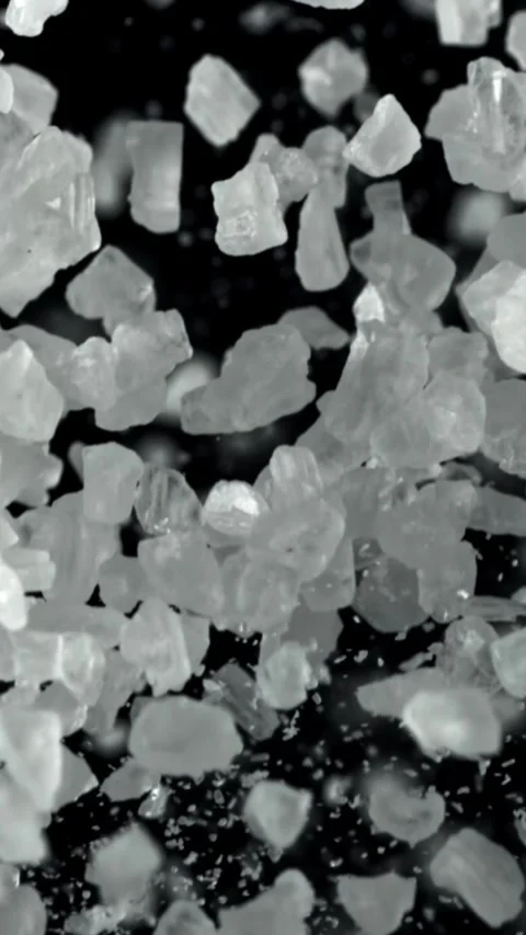 Salt flies up and down. Filmed on a high-speed camera at 1000 fps Stock Footage 335380118