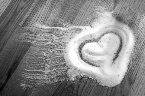 Salt in the form of a heart Stock Photos