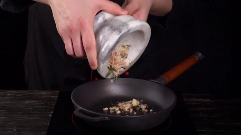 Salt in frying pan Stock Footage 84603777