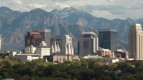Salt Lake City aerial downtown cityscape against the Wasatch Mountains Stock Footage