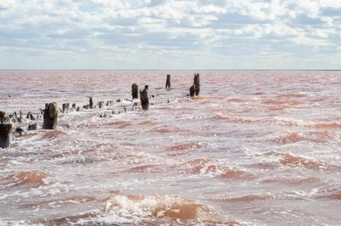 Salt lake. Clouds on a background of red water 스톡 사진
