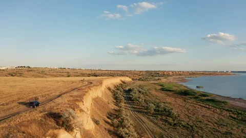 Salt lake sunset at the cliffs Stock Footage 129978084