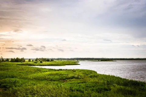 Salt marsh pond sunset sky Stock Photos