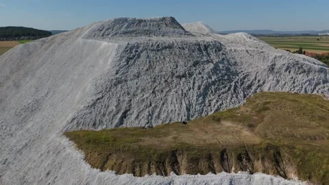 Salt Mountain Aerial Orbit Over Quarried Face 스톡 동영상 342860979