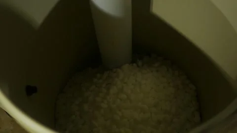 Salt Pellets inside Brine Tank or Water Filtration System Stock Footage 332576187