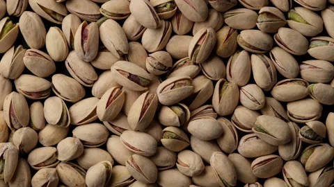 Salt pistachios nuts top view. Pistachio nuts in the peel. Whole nut kernels Stock-Footage 148287423