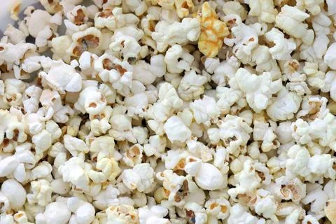 Salt Popcorn Texture Abstract Background. Big amount of pop corn Stock Photos