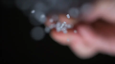 Salt pouring from below slow motion Stock-Footage 138063394