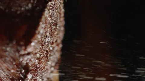 Salt on ready steak.Slow motion. 120 fps. Vertical video Stock Footage 172440032