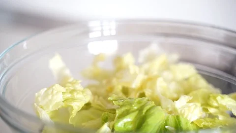 Salt on salad Video stock 112203038