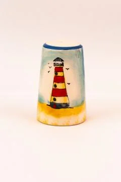 Salt shaker with lighthouse pictured Stock Photos