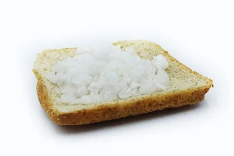 Salt on slice breads isolated on white background. Foto stock