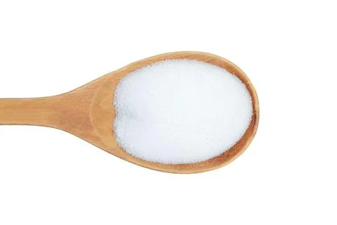 Salt on spoon isolated Stock Photos