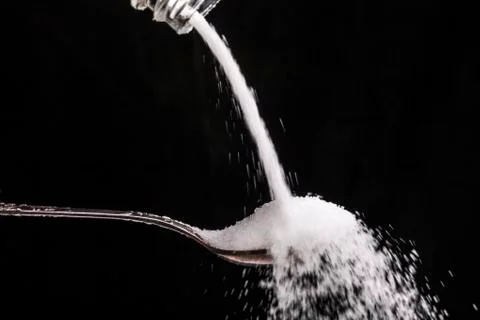 Salt in Spoon Stock Photos