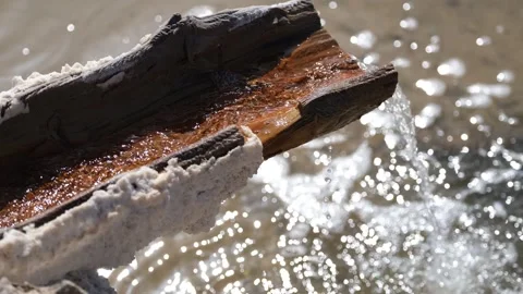 Salt water flows from the source into the pool 2 Stock Footage 294087560