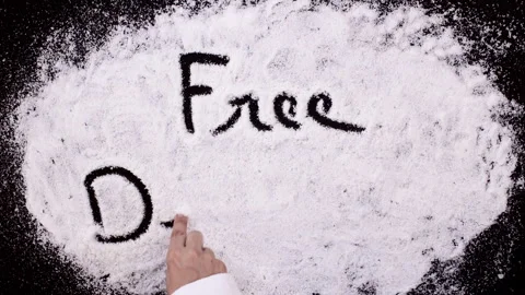 Salt Writing on Black Surface words Free Delivery Stock Footage 248749881