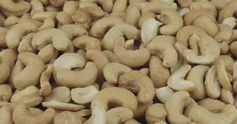 Salted cashew nuts closeup rotating loopable Stock Footage 146842066