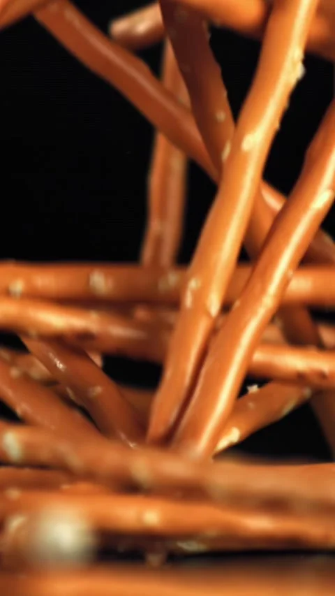 Salted cracker sticks fall on the table. Filmed on a high-speed camera at 1000 Stock Footage 335371265