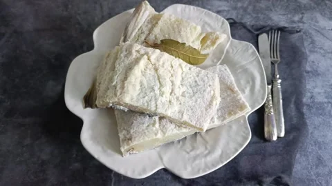 Salted dry codfish on dish Video stock 325843590