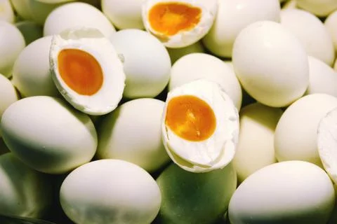 Salted duck eggs Half cut for sale in thailand market. Stock Photos