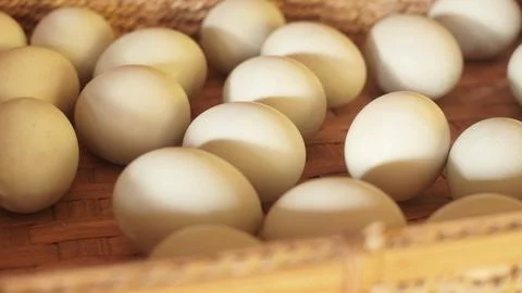 Salted eggs in basket Stock Photos
