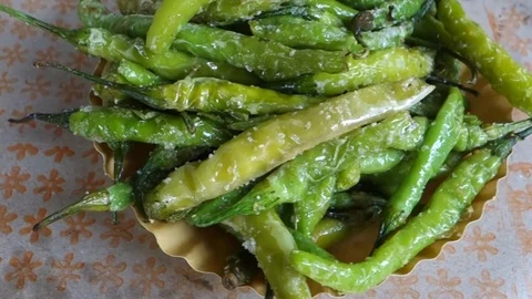 Salted-fried-green-chillies Video stock 74516894