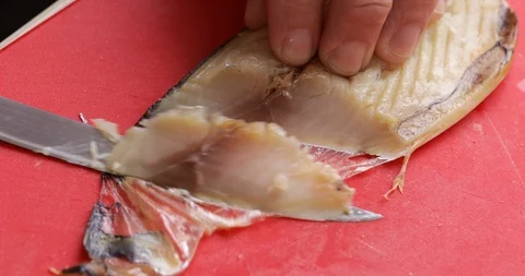 Salted mackerel fillet chunks, close-up Stock Footage 107950872