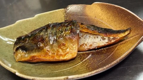 Salted Mackerel Plated on a Leaf-Shaped Dish (Saba Shioyaki), Japanese Food Stock Footage 345632966