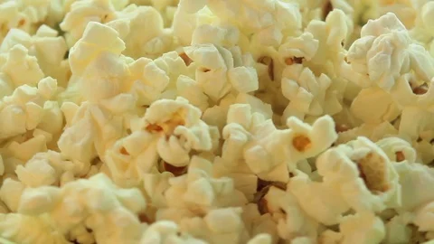 Salted popcorn rotating. Isolated on white background. Seamless loop 動画素材 80436108