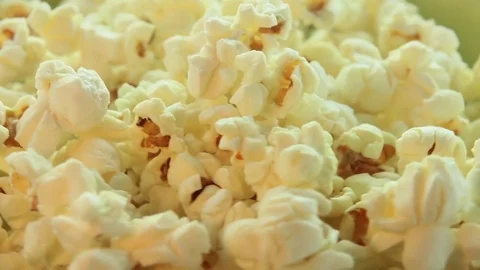 Salted popcorn rotating. Isolated on white background. Seamless loop Stock Footage 80436158