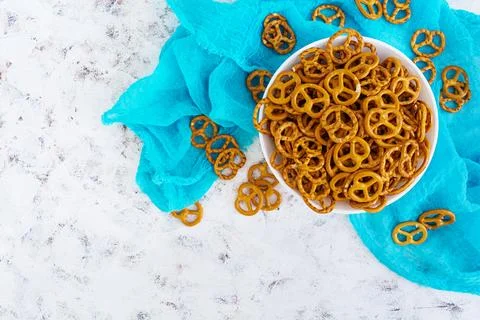 Salted pretzel on white background Stock Photos