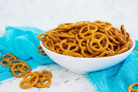 Salted pretzel on white background Stock Photos