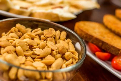 Salted raw peanuts Stock Photos