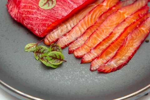 Salted red fish with sea salt Stock Photos