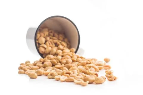 Salted roasted peanuts. Salted roasted peanuts isolated on white backgroun... Stock Photos