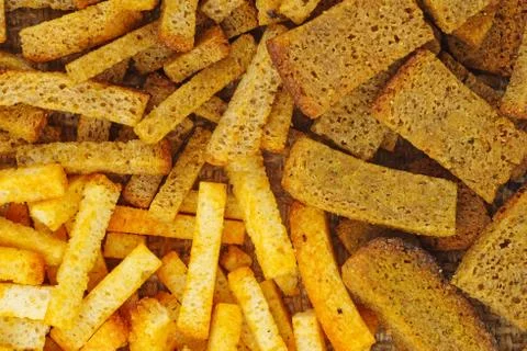 Salted rye and wheat bread crusts background Foto stock