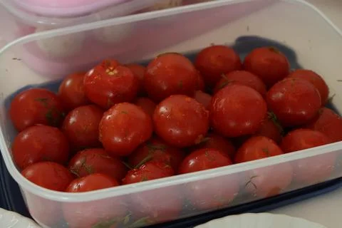 Salted tomatoes are on the table Stock Photos