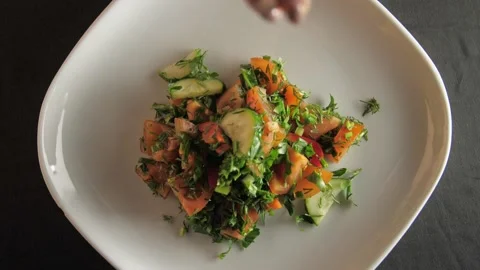 Salted vegetable salad and served with half a lime Stock Footage 132079495