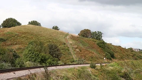 Saltern Cove, Devon: Steam train along the Torbay Steam Railway line Stock Footage 115573338
