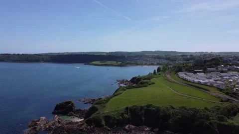 Saltern Cove, S. Devon, England: Drone View: Coast, railway line, holiday park Stock Footage 196838904