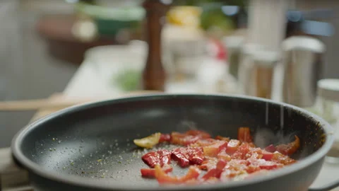Salting Fried Vegetables in Pan Stock Footage 249829411
