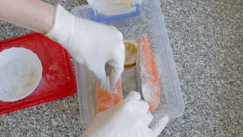 Salting of salmon slices Stock Footage 104883458