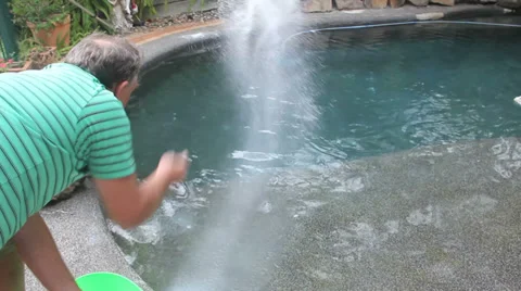 Salting A Swimming Pool Stock Footage 34407859