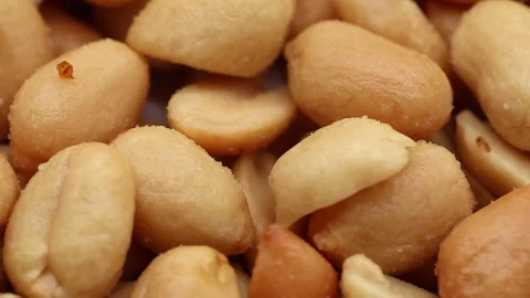 Salty and roasted peanuts, close-up Video stock 297747038