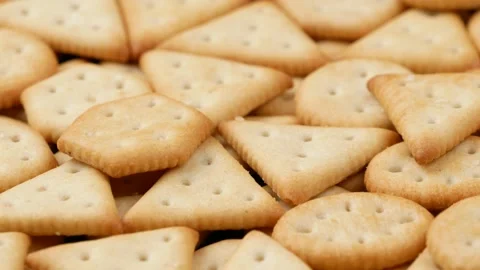 Salty cracker, side view. Cracker of different shapes, dolly shot. Stock Footage 165557680
