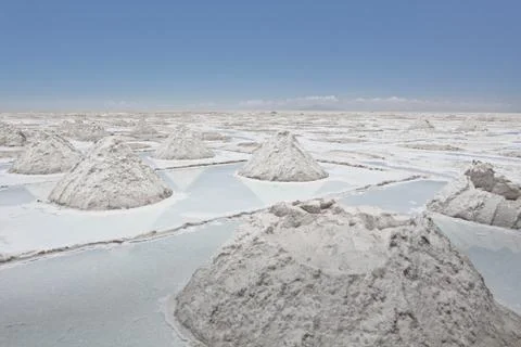 Salty ground and structures. Landscape of the Salar de Uyuni and lagoons li.. Stock Photos