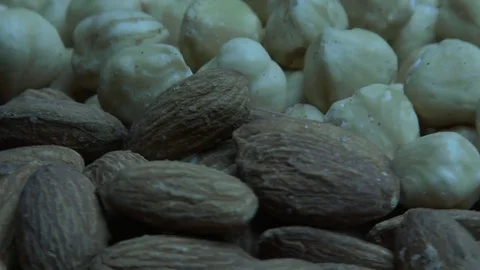 Salty hazelnuts and almonds 스톡 동영상 79715232
